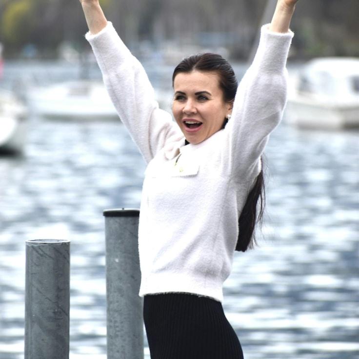 Alex Rivera, Lead Design Curator at HarborFieldTrail, reviewing corporate floral arrangements